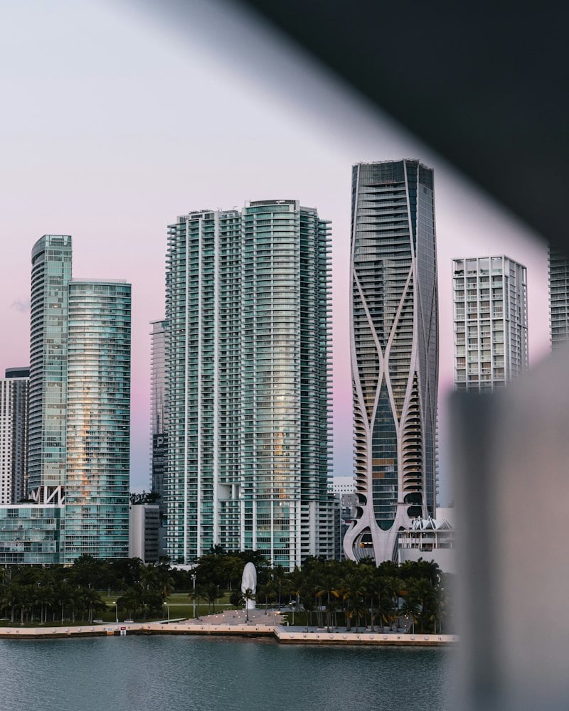 Waterfront residential towers in Miami at dusk
