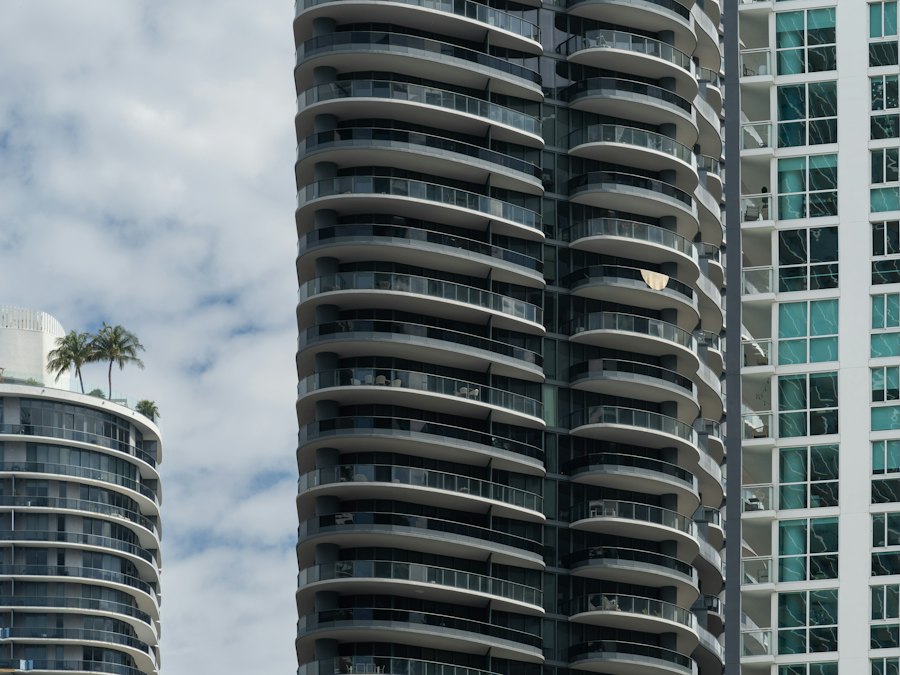 Glass residential tower with curved balconies